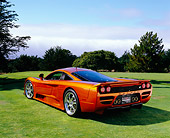 AUT 41 RK0024 02
2006 Saleen S7 Beryllium Rear 3/4 View On Grass By Trees