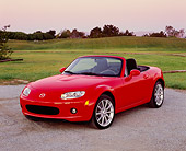AUT 41 RK0044 02
2006 Mazda, MX5, Miata, Convertible, Red 3/4 Front View On Pavement By Golf Course