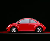 AUT 41 RK0080 04
2006 Volkswagen New Beetle Red Profile View On Red Floor Studio