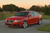 AUT 41 RK0082 01
2006 Audi, A4, 2.0 T, Red  Front 3/4 View On Pavement  By Grass Hills