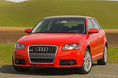 AUT 41 RK0144 01
2006 Audi A3 3.2 S-Line Red 3/4 Front View On Pavement By Grass Hills