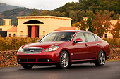 AUT 41 RK0195 01
2006 Infiniti M45 Red 3/4 Front View On Pavement By Building And Trees