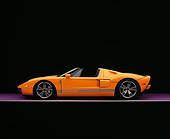 AUT 41 RK0213 06
2006 Ford GTX1 Yellow And Silver Profile View On Purple Floor Studio