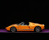 AUT 41 RK0213 11
2006 Ford GTX1 Yellow And Silver Profile View On Purple Floor Studio