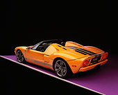 AUT 41 RK0215 10
2006 Ford GTX1 Yellow And Silver 3/4 Rear View On Purple Floor Studio