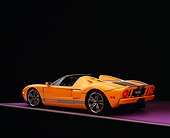 AUT 41 RK0217 01
2006 Ford GTX1 Yellow And Silver 3/4 Rear View On Purple Floor Studio