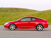 AUT 41 RK0326 01
2006 Acura RSX Type S Red Profile View On Pavement By Grass Hills
