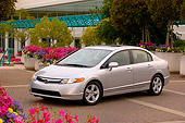 AUT 41 RK0451 01
2006 Honda Civic EX Silver Side 3/4 View On Pavement By Building And Trees