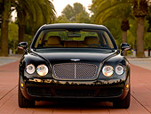 AUT 41 RK0470 01
2006 Bentley Continental Flying Spur Black Low Head On View On Pavement By Trees