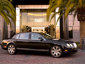 AUT 41 RK0478 01
2006 Bentley Continental Flying Spur Black 3/4 Side View On Pavement By Building And Trees