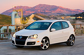 AUT 41 RK0483 01
2006 Volkswagen GTI Mk V White 3/4 Front View On Pavement At Dusk