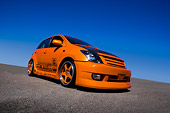AUT 41 RK0512 01
2006 Toyota Scion XA Orange Low 3/4 Front View On Pavement