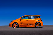 AUT 41 RK0515 01
2006 Toyota Scion XA Orange Low Profile View On Pavement