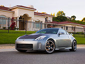 AUT 41 RK0568 01
2006 Nissan 350Z Silver 3/4 Front View On Pavement By House
