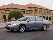 AUT 42 RK0091 01
2007 Nissan Maxima 3.5 SE Gray 3/4 Side View On Pavement By Building
