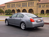 AUT 42 RK0092 01
2007 Nissan Maxima 3.5 SE Gray 3/4 Rear View On Pavement By Building