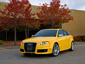 AUT 42 RK0109 02
2007 Audi RS4 Yellow 3/4 Front View On Pavement By Fall Trees