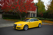 AUT 42 RK0117 01
2007 Audi RS4 Yellow 3/4 Side View On Pavement By House
