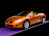 AUT 42 RK0132 01
2007 Mitsubishi Eclipse  Spyder GT Orange 3/4 Front View Studio