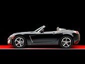 AUT 42 RK0133 02
2007 Saturn Sky Turbo Convertible Black Profile View On Red Floor Studio
