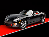 AUT 42 RK0135 01
2007 Saturn Sky Turbo Convertible Black 3/4 Front View On Red Floor Studio