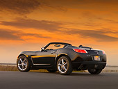 AUT 42 RK0140 01
2007 Saturn Sky Turbo Convertible Black Low 3/4 Rear View On Pavement