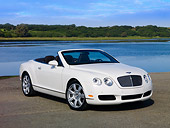 AUT 42 RK0209 01
2007 Bentley GTC Convertible White 3/4 Front View On Pavement By Water