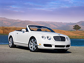 AUT 42 RK0211 01
2007 Bentley GTC Convertible White Low 3/4 Front View On Pavement By Water