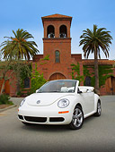 AUT 42 RK0220 01
2007 Volkswagen New Beetle Convertible White 3/4 Front View On Pavement By Tower