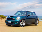 AUT 43 BK0015 01
2007 Mini Cooper S Green And Checkered 3/4 Front View On Beach