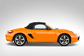 AUT 43 IZ0053 01
2010 Porsche Limited Edition Boxster Orange Profile View Studio