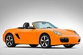 AUT 43 IZ0057 01
2010 Porsche Limited Edition Boxster Orange 3/4 Front View Studio