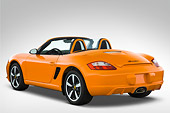 AUT 43 IZ0061 01
2010 Porsche Limited Edition Boxster Orange 3/4 Rear View Studio