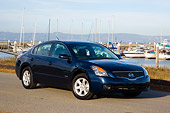 AUT 43 RK0083 01
2008 Nissan Altima Hybrid Dark Blue 3/4 Front View On Pavement By Marina Sky