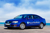 AUT 43 RK0086 01
2008 Volkswagen Passat BlueMotion Diesel Blue 3/4 Front View On Pavement By Water Sky