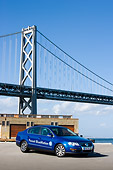 AUT 43 RK0089 01
2008 Volkswagen Passat BlueMotion Diesel Blue 3/4 Front View On Pavement By Bridge Water Sky