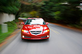 AUT 43 RK0148 01
2008 Acura TL Type-S HPT Red Head On View Driving