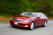AUT 43 RK0158 01
2008 Lexus LS 600h L Red 3/4 Front View Driving