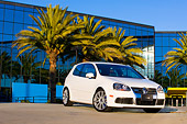 AUT 43 RK0201 01
2008 Volkswagen R32 White 3/4 Front View By Building Palm Trees