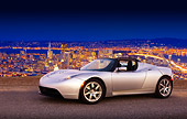 AUT 43 RK0231 01
2008 Tesla Roadster Silver 3/4 Front View On Pavement