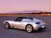 AUT 43 RK0235 01
2008 Tesla Roadster Silver 3/4 Rear View On Pavement