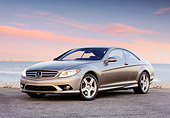 AUT 43 RK0276 01
2008 Mercedes-Benz CL550 Pewter 3/4 Front View By Water Blue Sky