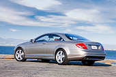 AUT 43 RK0278 01
2008 Mercedes-Benz CL550 Pewter 3/4 Rear View By Water Blue Sky