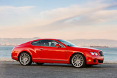 AUT 43 RK0290 01
2008 Bentley Continental GT Speed Red 3/4 Front View By Water At Dusk
