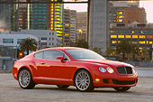 AUT 43 RK0293 01
2008 Bentley Continental GT Speed Red 3/4 Front View In City At Dusk
