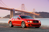 AUT 43 RK0295 01
2008 Bentley Continental GT Speed Red 3/4 Front View By Bridge At Dusk