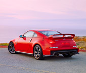 AUT 43 RK0302 01
2008 Nissan NISMO Z Red 3/4 Rear View At Dusk
