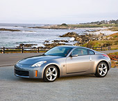 AUT 43 RK0319 01
2008 Nissan 350Z Silver 3/4 Front View On Pavement By Trees