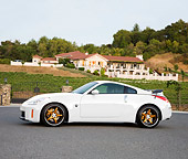 AUT 43 RK0325 01
2008 Nissan 350Z White Profile View On Pavement By House
