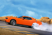 AUT 43 RK0388 01
2008 Dodge Challenger SRT8 Orange Burning Tires On Pavement